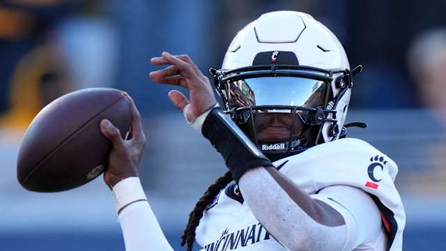 Cincinnati Bearcats quarterback Emory Jones (5) throws in the second quarter during an NCAA college football game between the Cincinnati Bearcats and the West Virginia Mountaineers, Saturday, Nov. 18, 2023, at Milan Puskar Stadium in Morgantown, W. Va.